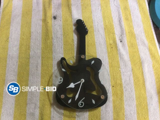 Lot 58-60629 - 14 in. Guitar Clock