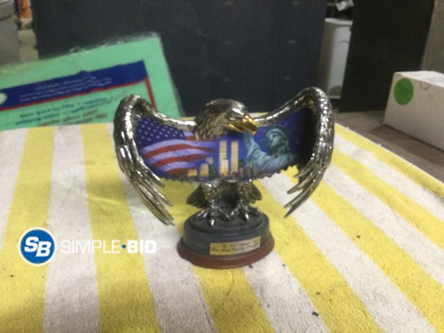 Lot 58-59602 - 9-11-2001 We will Never Forget Eagle Commemorative Statue
by the Bradford Exchange