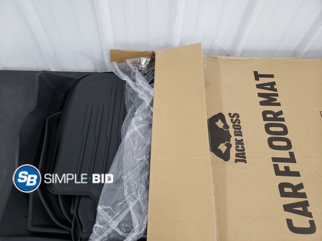 Lot 58-57079 - Jack Boss floor mats designed for the 5-seater Tesla Model Y.