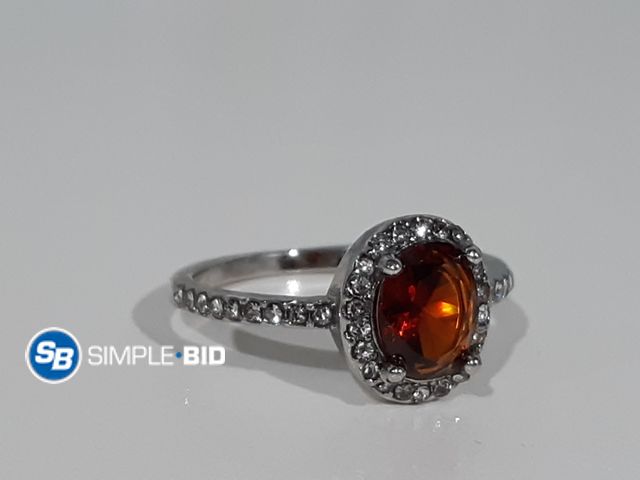 Lot 58-56328 - Faux Ruby silver Ring - Size 10