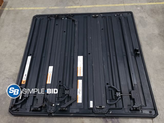 Lot 58-40483 - Toyota Tacoma Fold up Bed Topper - Light use/New  5ft bed