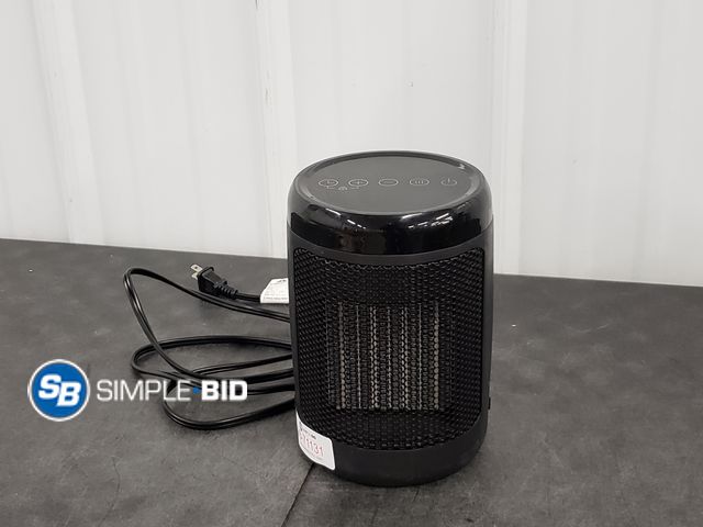 Lot 58-71131 - Omni Mini Heater - tested to power on - used but in good condition