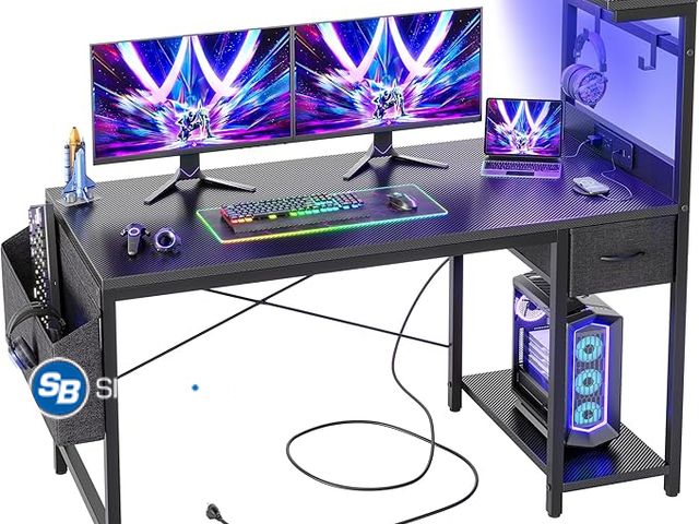 Lot 58-31725 - TIQLAB Gaming Desk 47 inch with Power Outlet and LED Light, Computer Desk with Reversible Shelves an...
