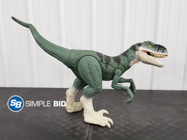 Lot 58-50449 - Rebirth strike attack dinoasaur toy - appears unused