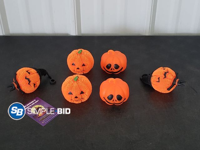 Lot 58-83355 - Lot of (6) New Glow in the Dark PUMPKIN Squishes