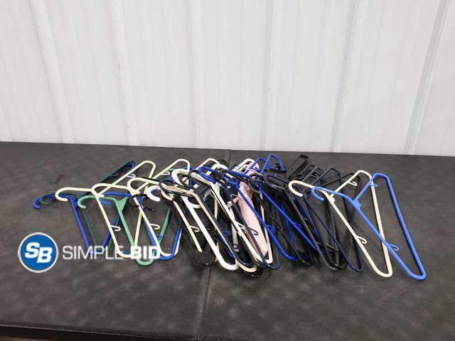Lot 58-75824 - Lot of (25+) Plastic Clothes Hangers