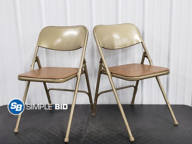 Lot 58-80949 - Lot of (2) Metal Folding Chairs