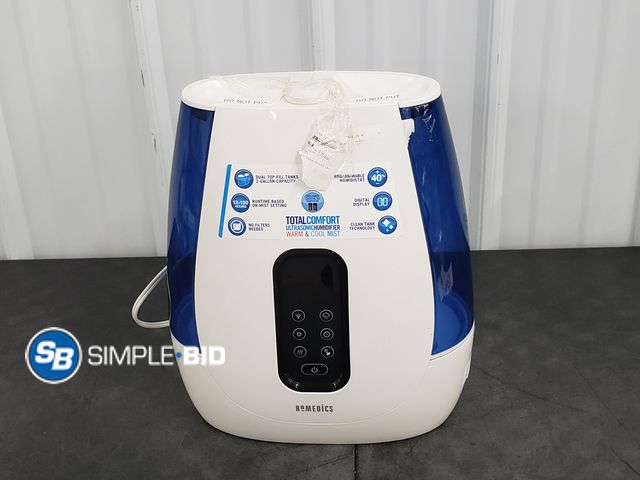 Lot 58-58912 - Total Comfort Ultra sonic Humidifier Warm and cool mist - appears unused
