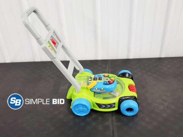 Lot 58-67481 - Vtech Toy Lawnmower, appears unused