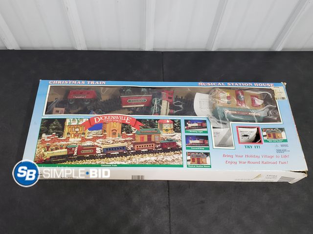Lot 58-72073 - Dickensville Collectables - Christmas Train - Musical Station house - Open Box