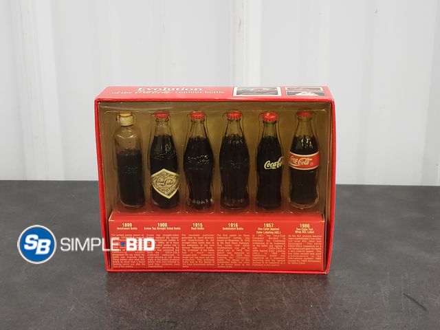 Lot 58-74210 - The Evolution of the Coca-Cola Contour bottle