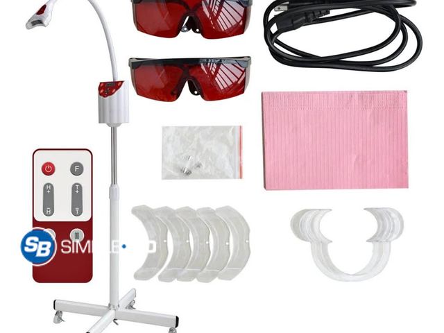 Lot 58-34553 - TW5 Dental Teeth Whitening Professional Mobile 4 Colors Machine with Remote Control w/ Gel Included