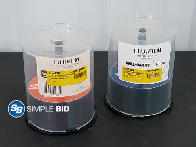 Lot 58-36339 - Lot of (2) Spindles of Archival Photo Cd's and DVD's - approx. 50 in each spindle