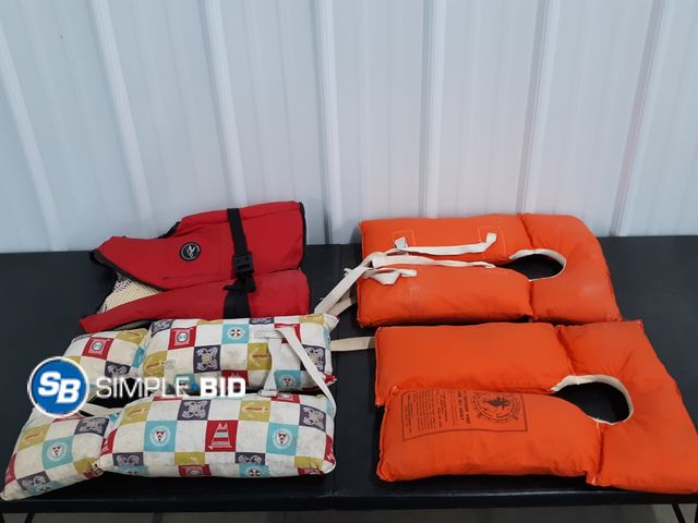 Lot 58-36485 - Lot of (3) Buoyant Vests -- Adult size - and Red head vest - used but in good condition