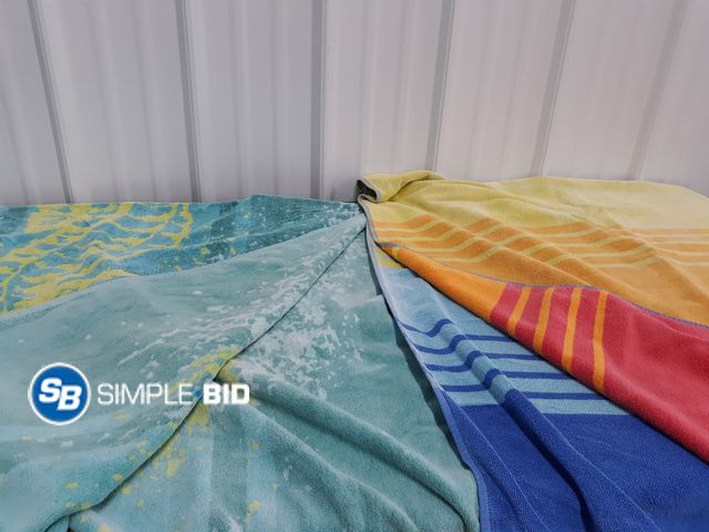 Lot 58-78416 - Lot of (2) Kirkland Resort Living BEACH TOWELS - used but in good condition
