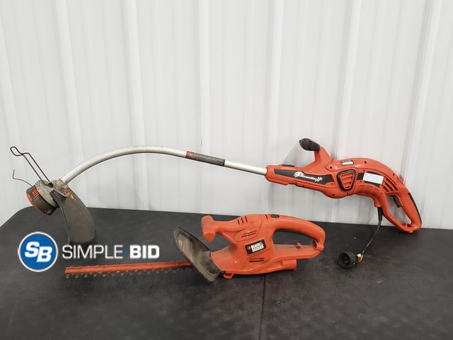 Lot 58-57964 - Lot of (2) Tools including (1) Black and Decker saw (1) Grasshopper Black and Decker weed whip - use...