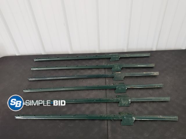 Lot 58-54473 - Lot of (6) Green Metal Garden Fence Stakes
