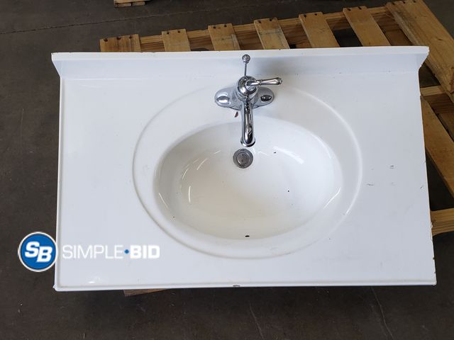 Lot 58-71862 - Porclean Sink with Faucet and Plumbing (small chip on front edge) - approx. 36" x 22"