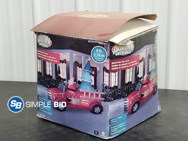 Lot 58-75403 - Airblown Inflatable - North Pole Fire Truck Santa