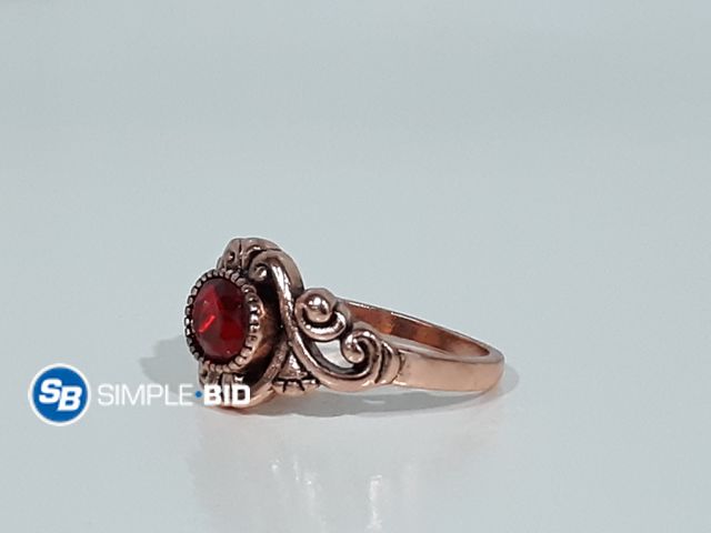 Lot 58-17873 - Faux Rose Gold Ruby Ring - Size 10