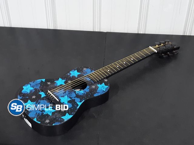 Lot 58-26427 - First Act Kids Guitar - Missing 1 String