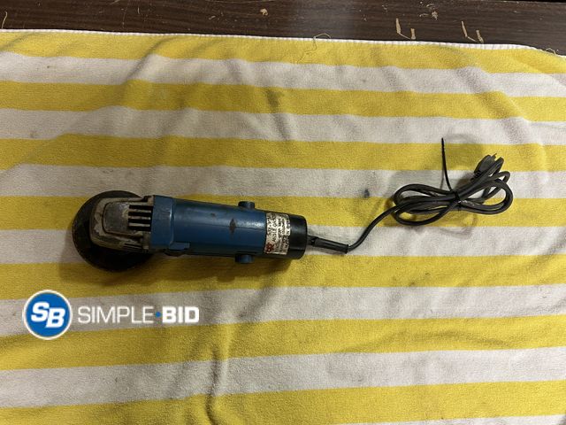 Lot 58-38668 - Electric Powered SIM-115A Angle Grinder