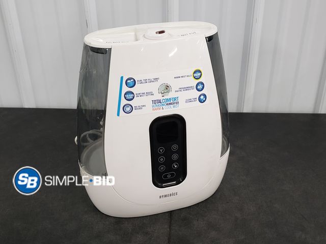 Lot 58-50487 - Total Comfort Ultrasonic Humidifier Warm and Cool Mist - appears unused