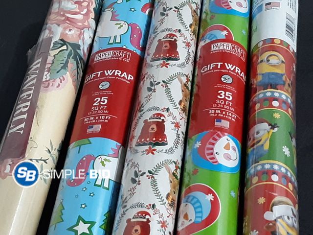 Lot 58-32382 - Lot of (5) Rolls of Wrapping paper -- Minions Christmas -- Unicorn -- Bear -- snowman and more - app...
