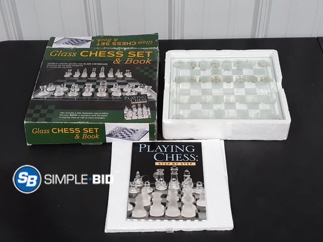Lot 58-28813 - Glass CHESS Set and book - open box