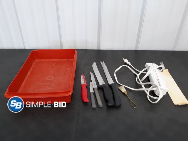 Lot 58-78096 - Vintage Tupperware 9x13 filled with sharp knives