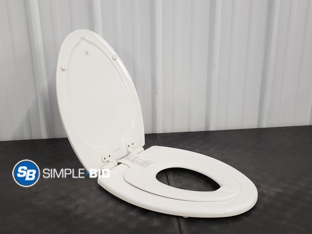 Lot 58-56443 - White Elongated Toilet seat with Kids Seat Built in