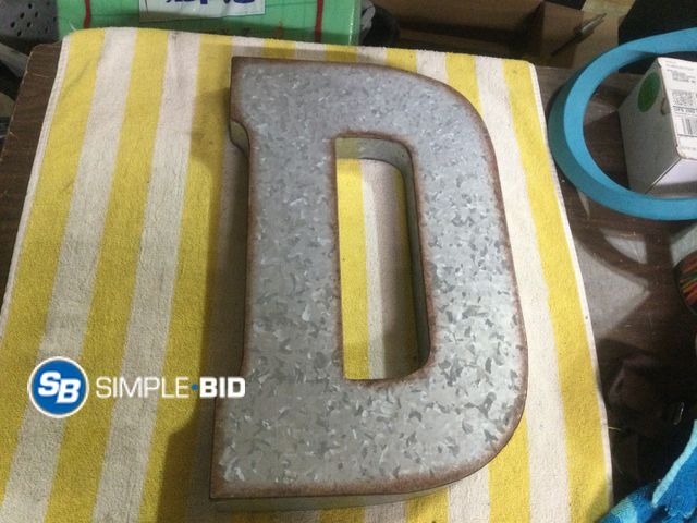 Lot 58-60635 - Large Metal "D" Sign