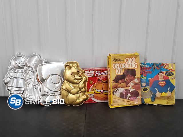Lot 58-67769 - Lot of (7) Vintage Cake Pans, including Pooh, Garfield, Wilton Cake accessories