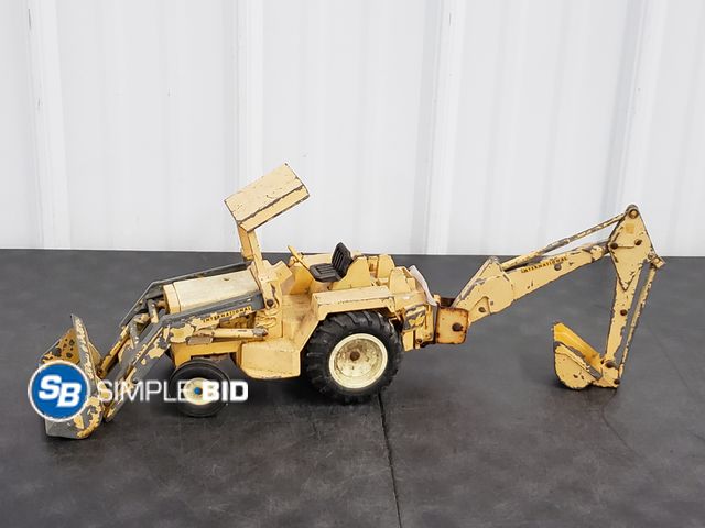 Lot 58-74731 - Rustic Metal International Backhoe Loader
