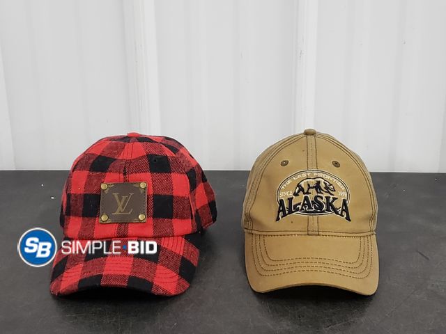Lot 58-77897 - Lot of (2) Hats (1) Alaska, (1) LV (Red and Black Checkered) - in good condtion