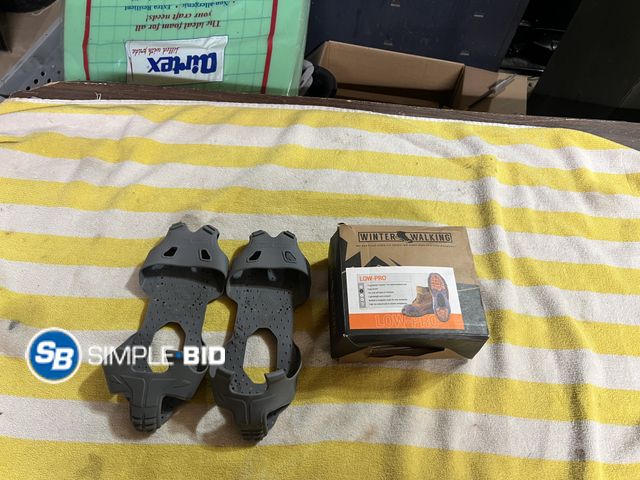 Lot 58-59616 - Lot of (2) Pair of Winter walking Ice Cleats
1 Size Small 1 Size Medium (new in box)