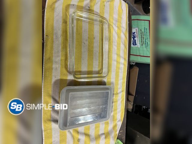 Lot 58-60625 - Lot of (2) Casserole Dishes 1-Metal with a lid the other Pyrex with no lid