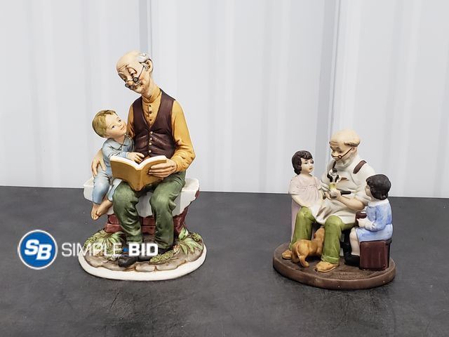 Lot 58-80200 - Lot of (2) Ceramic Figurines -- (1) 8" Grandpa on Bench reading to his Grandson (1) Norman Rockwell ...
