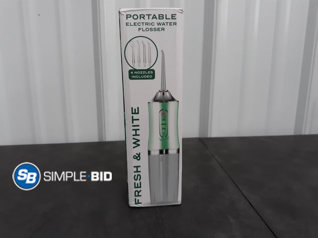 Lot 58-30274 - Portable Electric Water Flosser