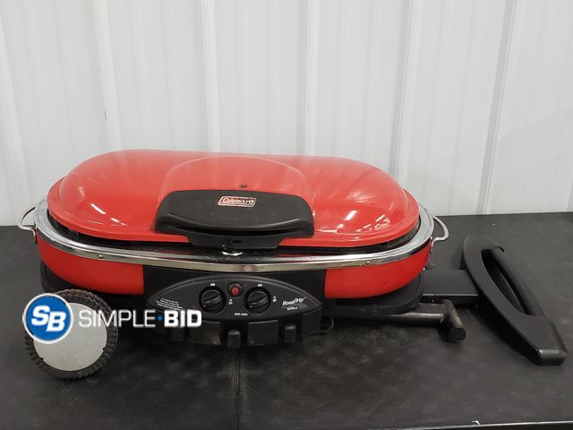 Lot 58-67513 - Coleman RoadTrip Grill/ Fold-Down Portable Propane Grill on Wheels- Appears to be in Good Used Condi...