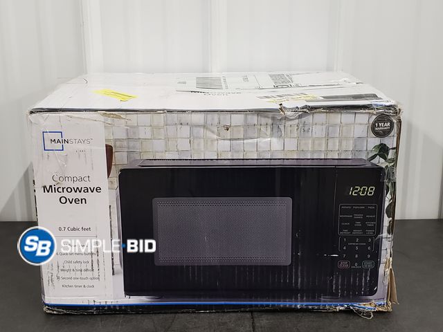Lot 58-72271 - Mainstays Compact Microwave Oven - 0.7 Cubic Feet - 700 Watts - Appears Unused