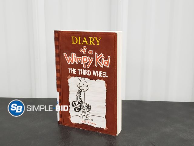 Lot 58-41170 - Diary of a WIMPY KID -- THE THIRD WHEEL paperback book - in good condition