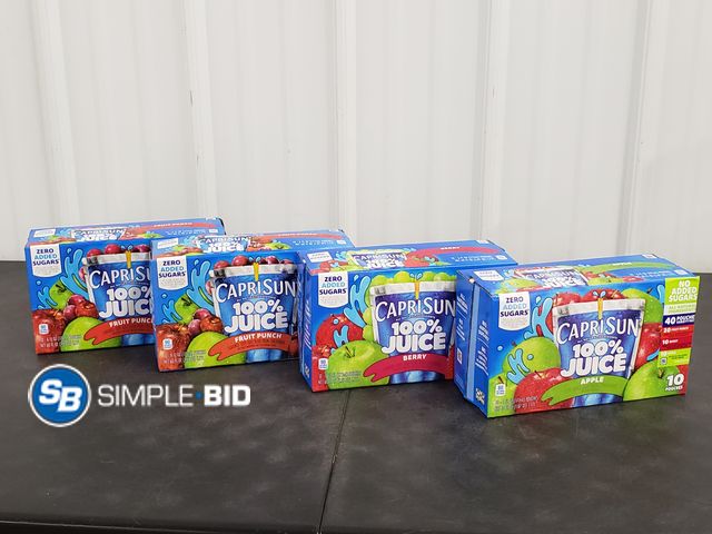Lot 58-72397 - Lot of (4) Boxes of CAPRI SUN -- (2) Fruit Punch (1) Berry (1) apple - 10 pouches in each box - unop...