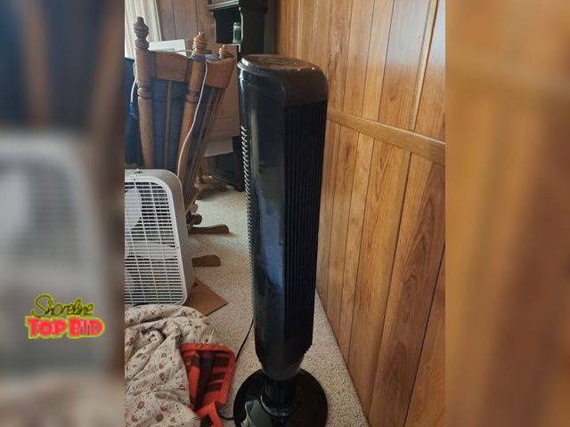 Lot 59-76021 - Rotating tower heater..works good..