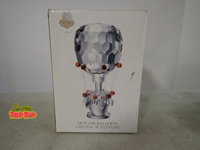 Lot 59-33401 - Crystal Hot Air Balloon Sculpture has been Hand Faceted and Assembled of Glistening Crystal that wil...