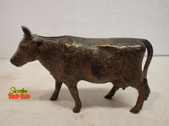 Lot 59-14498 - Antique Cast Iron Cow Still Bank, early 20th Century 3 1/2" tall x 5 1/2" long