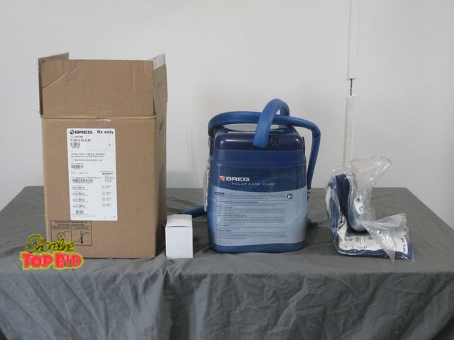 Lot 59-10026 - Breg Polarcare10710 ice cooling chest shoulder wrap w/AC adapter.  Helps with cold therapy for rehab...