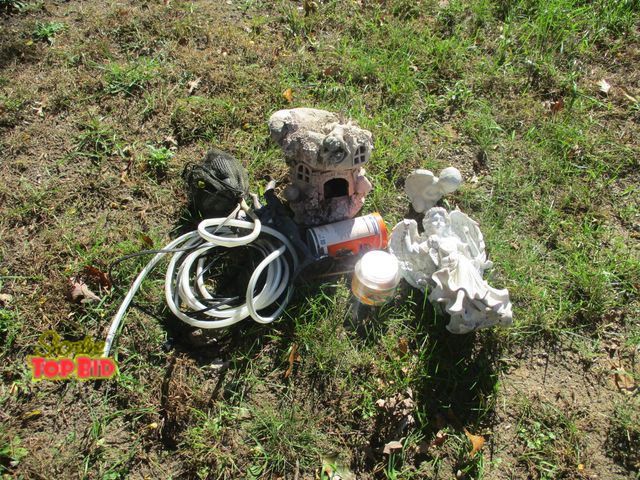 Lot 59-92055 - pond pump works great. Small amount fish food, angel, fairy house.