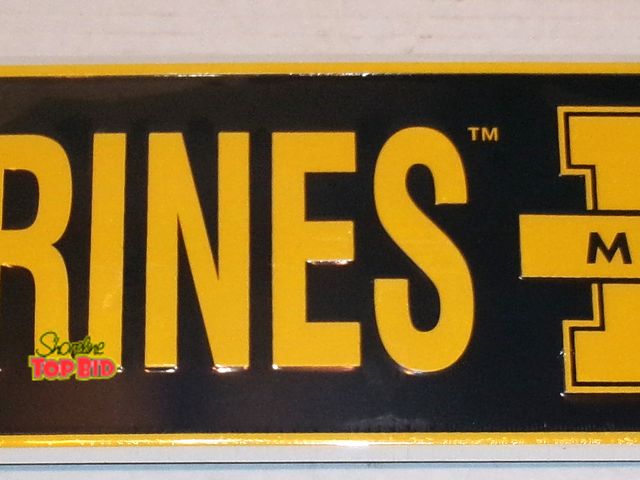 Lot 59-74561 - Large New Michigan Wolverines Metal Street Sign. Measures 24"X5". Still in wrap. Too Cool!