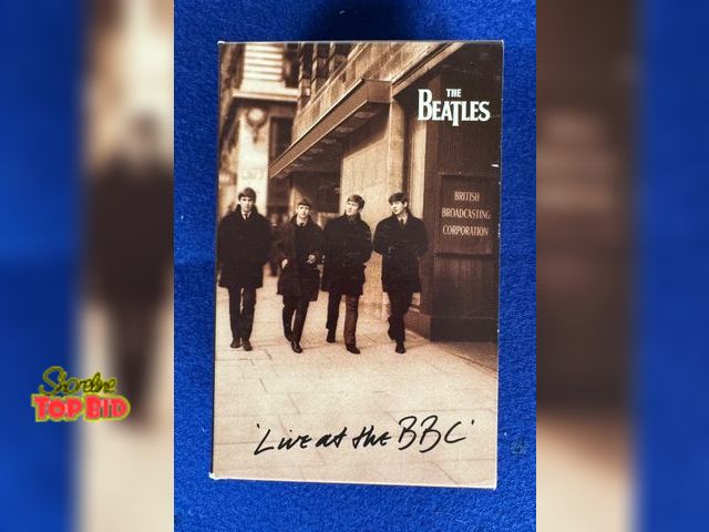 Lot 59-43523 - Beatles 2 cassette set with slip cover and mini history booklet